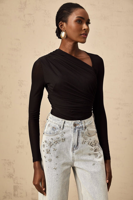 A black bodysuit with an asymmetric design featuring a split front and sleeveless style on a model against a plain background