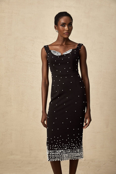 A black midi dress with faux pearl embellishments named Apolline