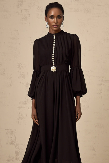 A black pleated midi dress with a button front closure and the name Viviane