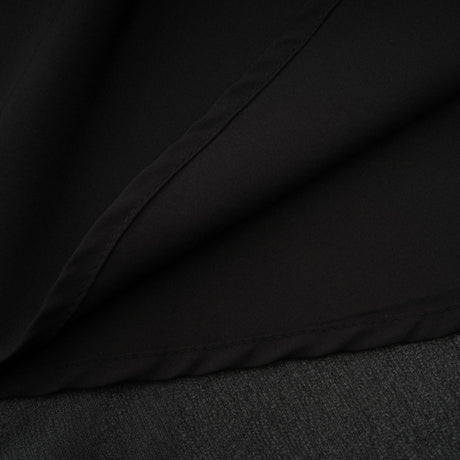 A black pleated midi dress with a button front closure featuring the name Viviane