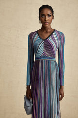 A blue metallic midi dress with pleated design and named Mathilde