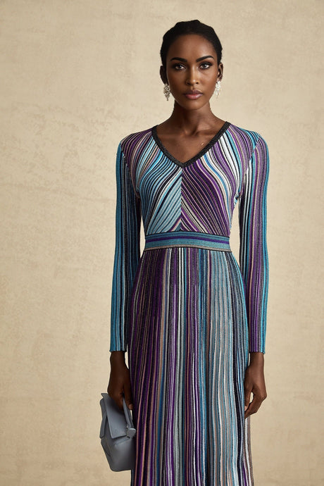 A blue metallic midi dress with pleated design and named Mathilde