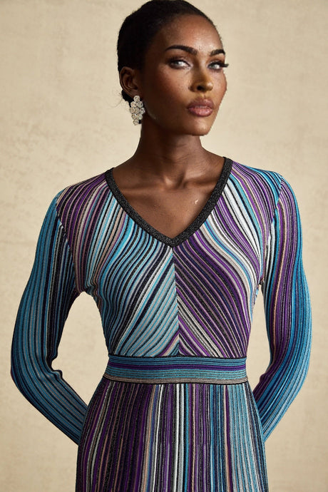 A blue metallic midi dress with pleated details and a shimmering finish named Mathilde