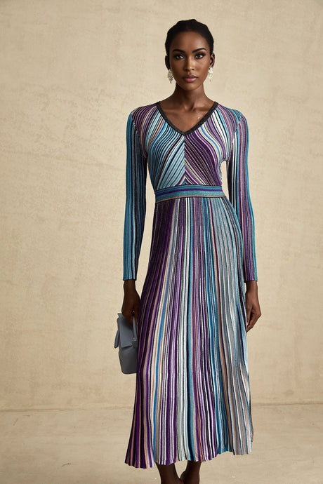 A blue metallic pleated midi dress with a feminine silhouette named Mathilde