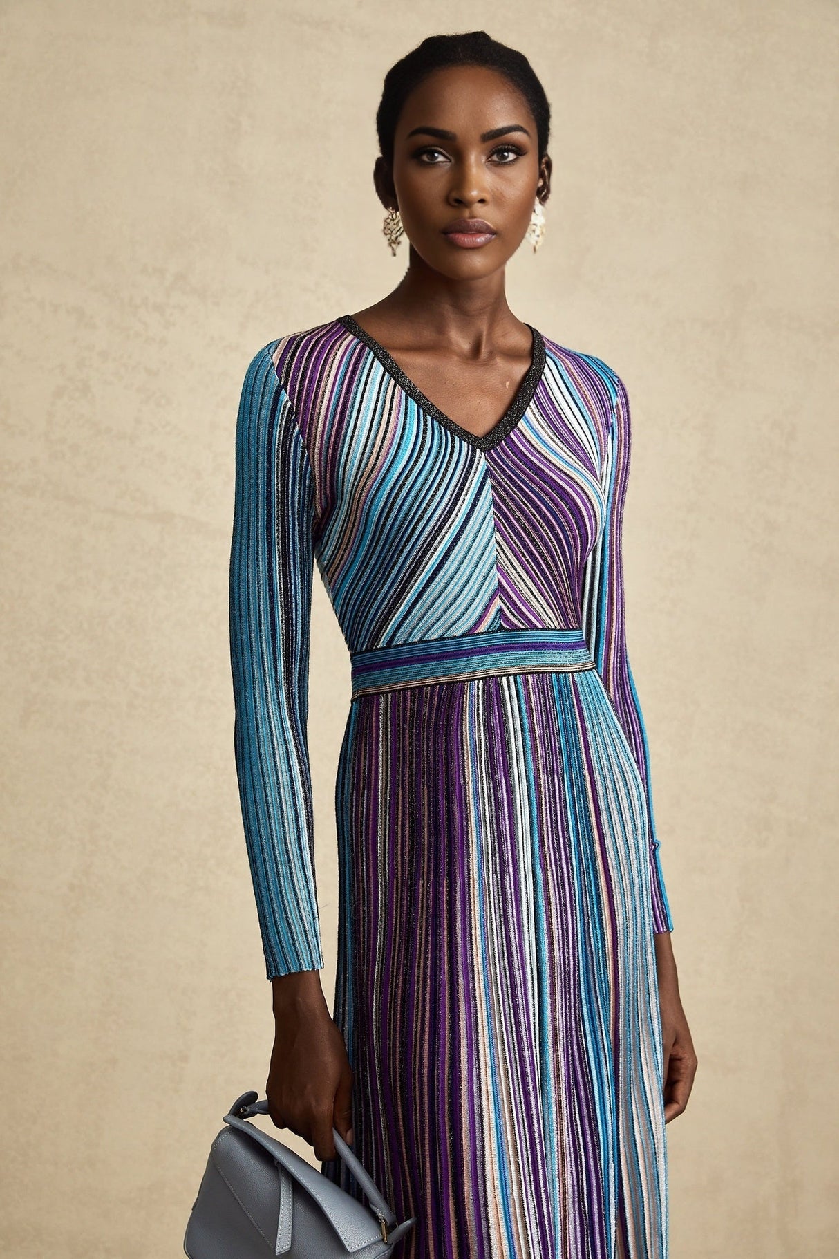 A blue metallic pleated midi dress with a feminine silhouette named Mathilde