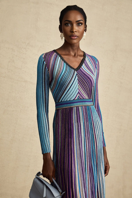 A blue metallic pleated midi dress with a feminine silhouette named Mathilde