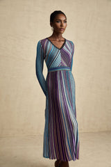 A blue metallic pleated midi dress with a flowing silhouette named Mathilde