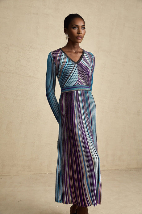 A blue metallic pleated midi dress with a flowing silhouette named Mathilde