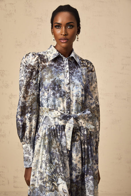 A blue midi dress with a floral print pattern named Irina