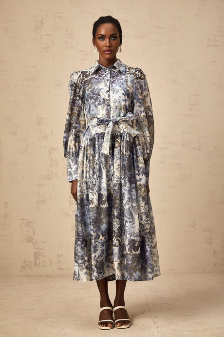 A blue midi dress with a floral print pattern named Irina