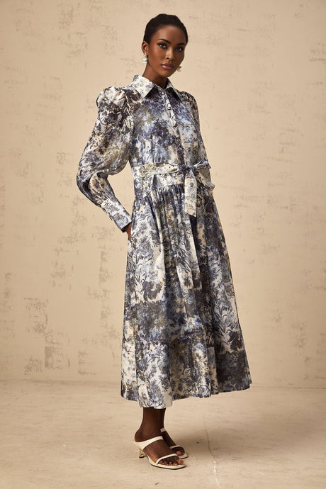 A blue midi dress with a floral print pattern named Irina