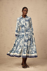 A blue midi dress with a graphic print pattern named Adelaide