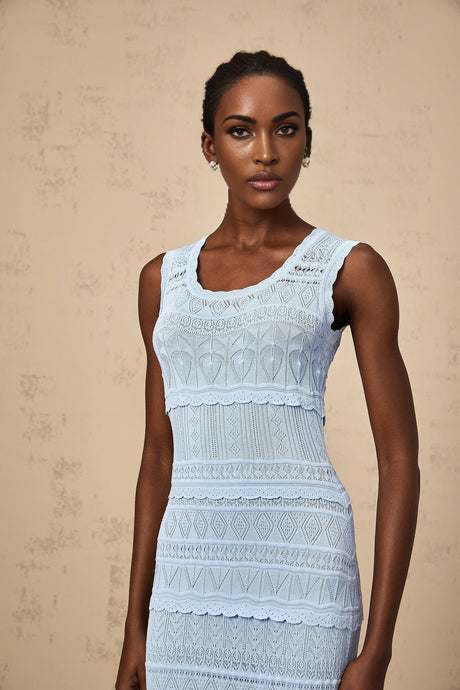 A blue midi dress with crochet knit detailing and ruffled trim accents named Mailys