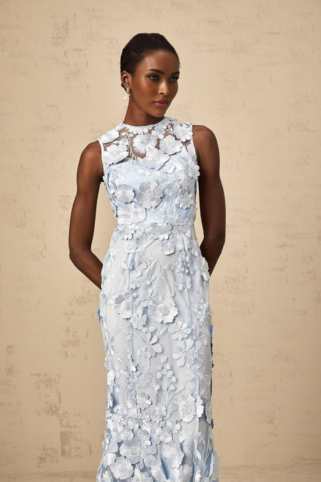 A blue midi dress with floral applique details by Herta