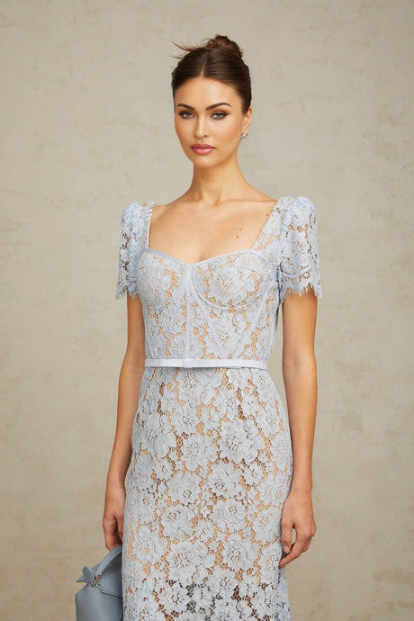 A blue midi dress with floral lace pattern and boned structure named Audrey