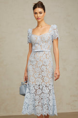 A blue midi dress with floral lace pattern featuring boned structure and named Audrey