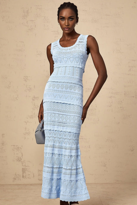 A blue midi dress with ruffled trim and crochet knit texture featuring a feminine silhouette