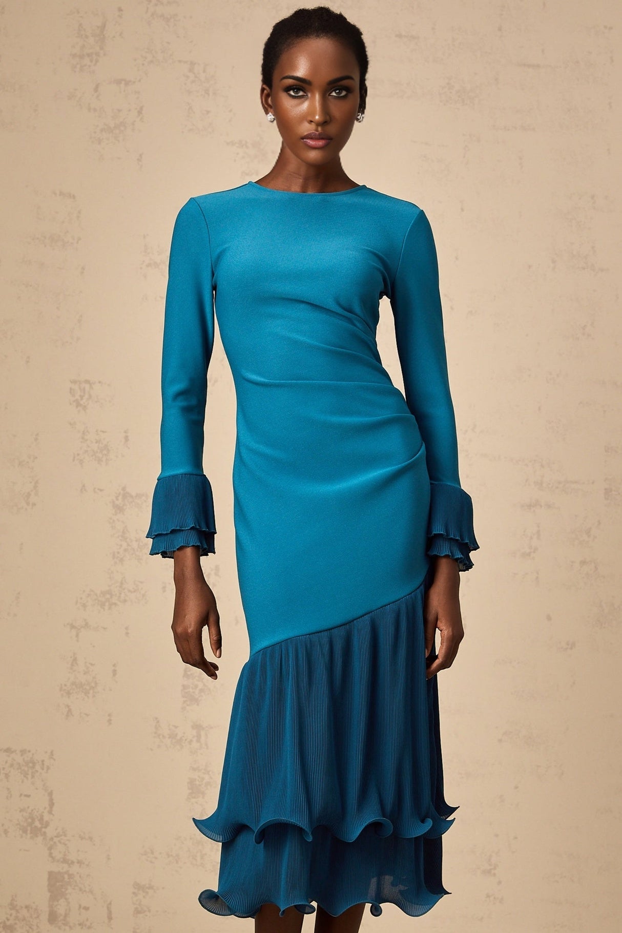 A blue midi dress with ruffled trim and paneled design featuring a feminine silhouette and flowy fabric