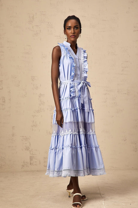 A blue midi dress with ruffles and floral lace trim featuring a tiered skirt design called Olena