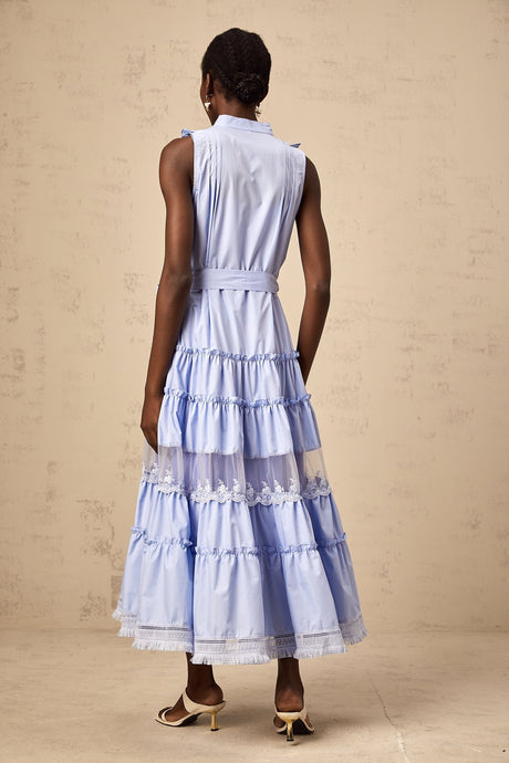 A blue midi dress with ruffles and floral lace trim featuring a tiered skirt design named Olena