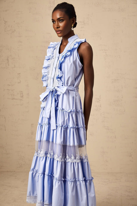 A blue midi dress with ruffles and floral lace trim featuring a tiered skirt design named Olena