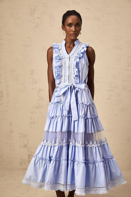 A blue midi dress with ruffles and floral lace trim featuring a tiered skirt design named Olena