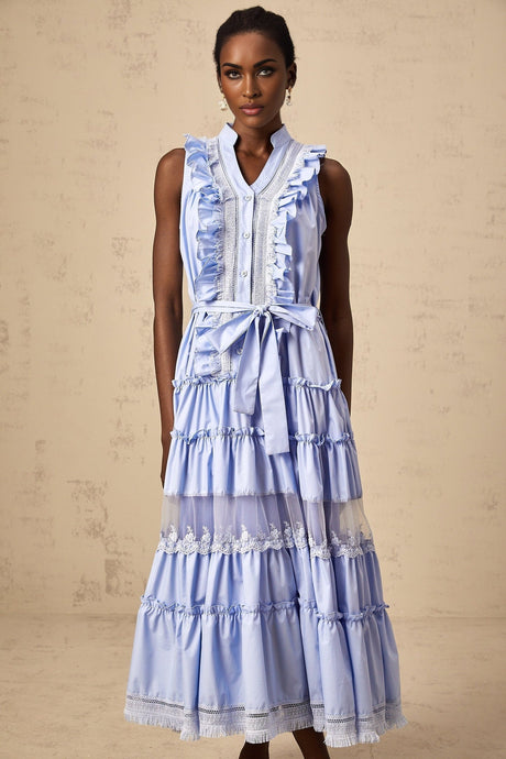 A blue midi dress with ruffles and floral lace trim featuring tiered layers and a feminine silhouette