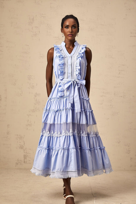 A blue midi dress with tiered ruffles and floral lace trim named Olena featuring a feminine and romantic design