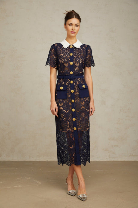 A dark blue midi dress with floral crochet lace pattern featuring an intricate design throughout the garment