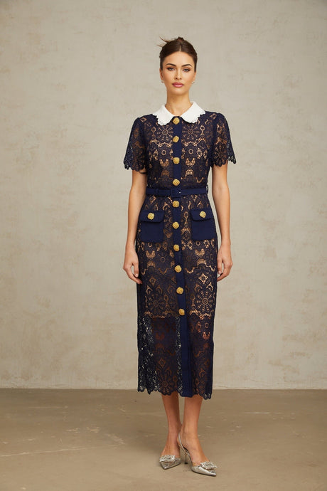 A dark blue midi dress with floral crochet lace patterns covering the entire garment The dress features a fitted silhouette and delicate lace detailing throughout