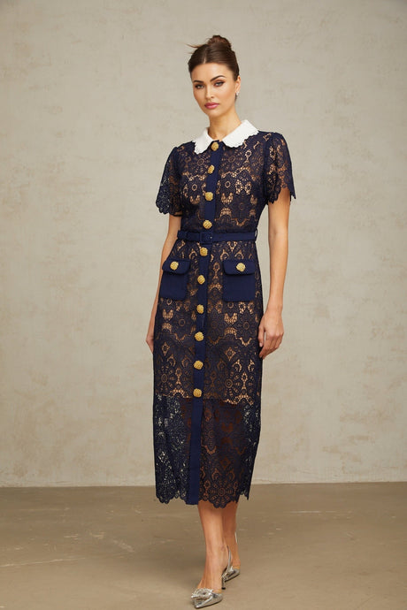A dark blue midi dress with intricate floral crochet lace detailing covering the entire garment