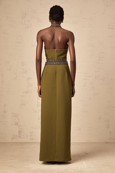A light green top and skirt set with daisy floral beaded trim details along the edges creating a matching outfit ensemble