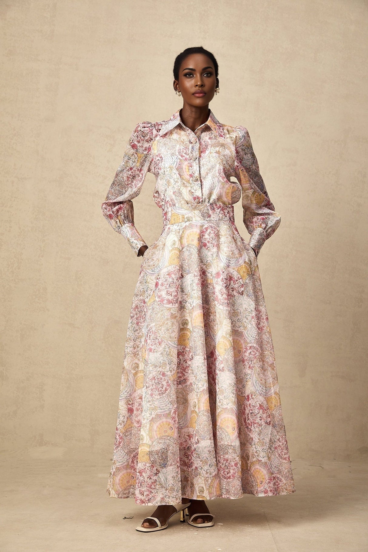 A matching set featuring a cherry pink shirt and skirt with a pattern print design The shirt and skirt are shown together as a coordinated outfit