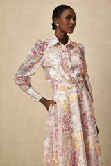 A matching set featuring a cherry pink shirt and skirt with a pattern print design