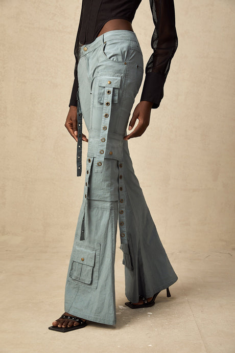 A pair of flared cargo trousers with belt loops named Mila featuring a wide leg silhouette and multiple pockets on the sides