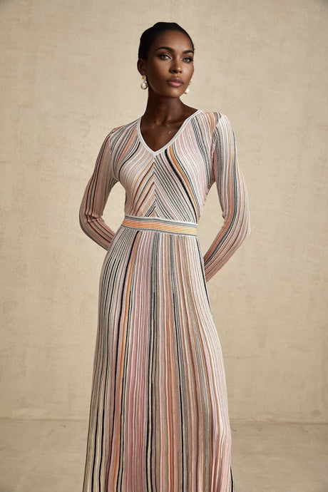 A pink metallic pleated midi dress with a feminine silhouette named Mathilde