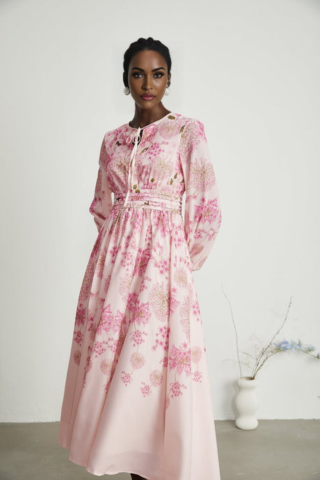 A pink midi dress with a floral print pattern named Yvette