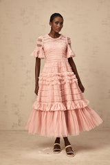 A pink midi dress with ruffled tulle and dot details named Aimee