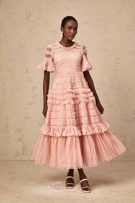 A pink midi dress with ruffled tulle and dot details named Aimee