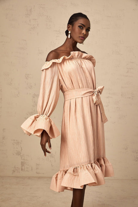 A pink midi dress with ruffles and a tied waist detail named Agathe