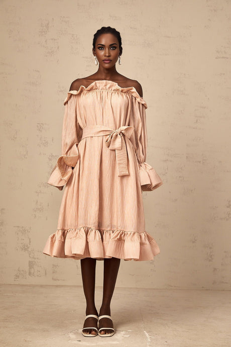 A pink midi dress with tied waist and ruffled details named Agathe