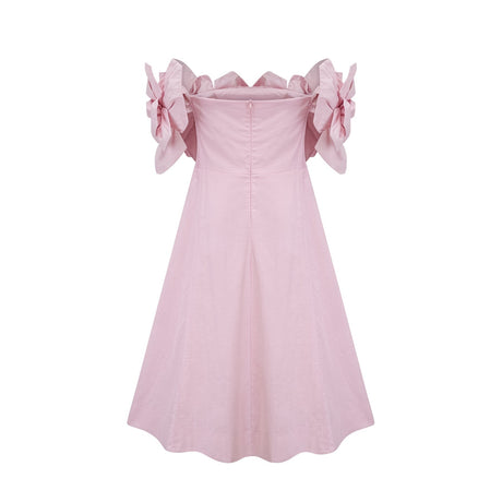 A pink offshoulder midi dress featuring 3D petal details named Juliette