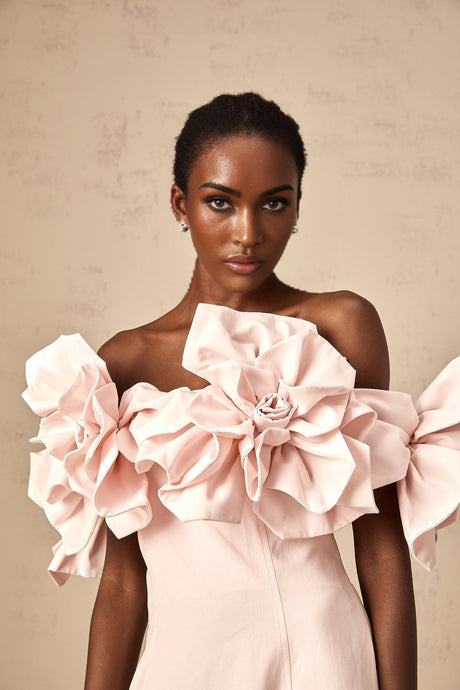 A pink offshoulder midi dress with 3D petal details named Juliette