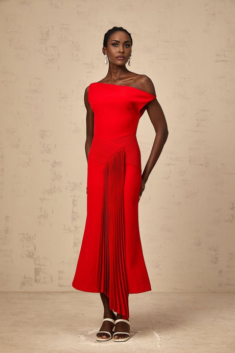 A red asymmetric midi dress with draped detailing featuring a flowing design and uneven hemline