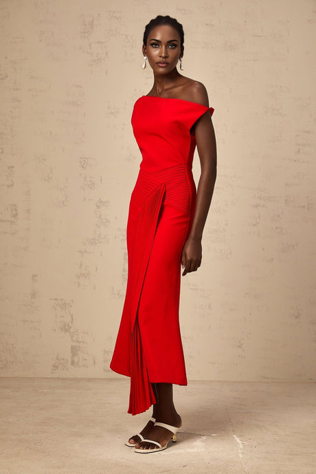 A red asymmetric midi dress with draped details named Laurine featuring an uneven hemline and flowing fabric
