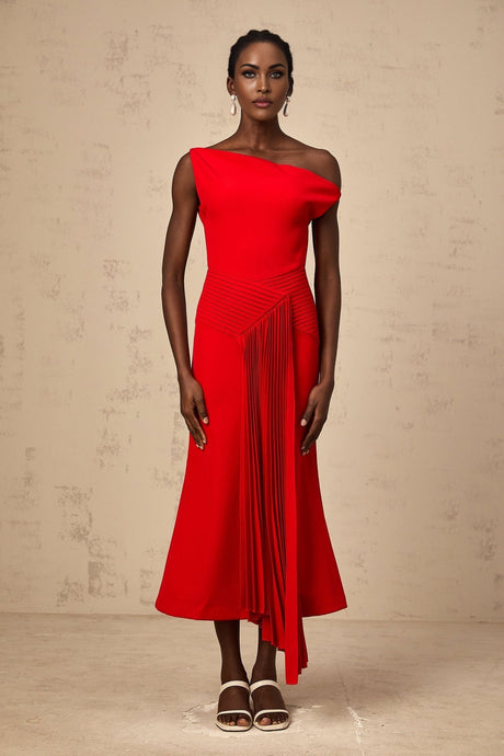 A red asymmetric midi dress with draped fabric detailing named Laurine featuring an uneven hemline and flowing silhouette