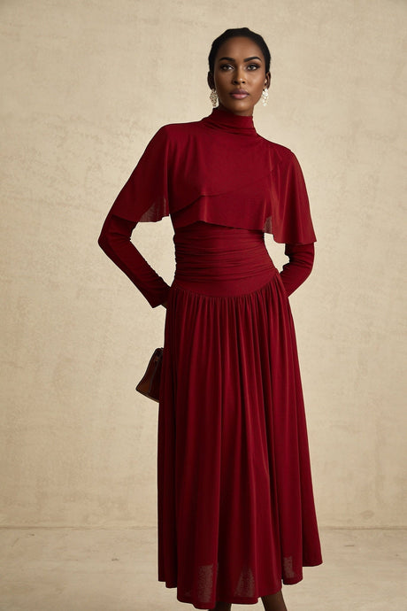 A red midi dress with ruched detailing and a flap design named Camille