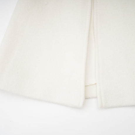 A stylish jacket featuring a capelike design with embellishments named Eleonore