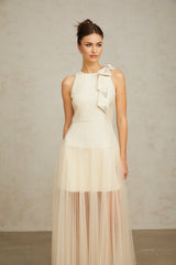 A white midi dress with a bow detail and tulle panels named Therese