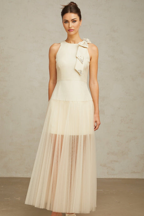 A white midi dress with tulle panels and a bow detail named Therese